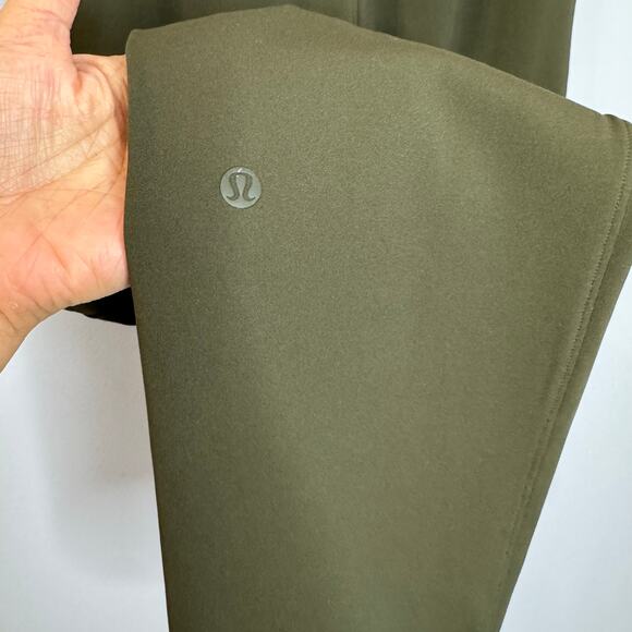 Lululemon On the Fly 7/8 Pant Drawstring Woven Dark Olive Women's 4 - Picture 9 of 11